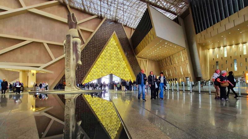 The atrium of the Grand Egyptian Museum, with the colossal statue of Ramesses II