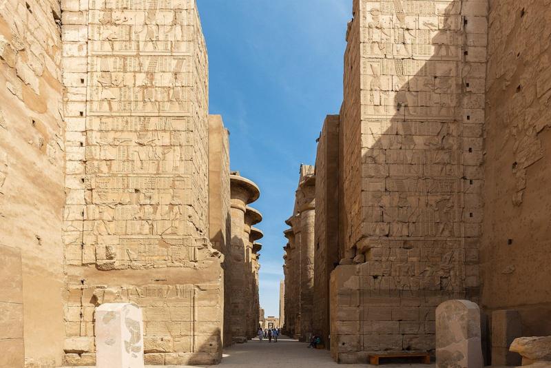 Carved sandstone temple walls in Luxor